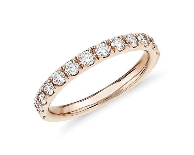 Shine bright with the elegant beauty of this 14k rose gold diamond ring adorned with a row of dazzling pavé-set round diamonds.