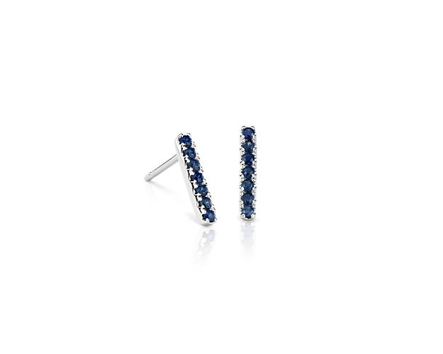 These petite sapphire gemstone bar earrings will be an everyday go-to pair, with just the right amount of color. Crafted in a classic 14k white gold bar design, they feature pavé-set round blue sapphires and a secure push back closure.